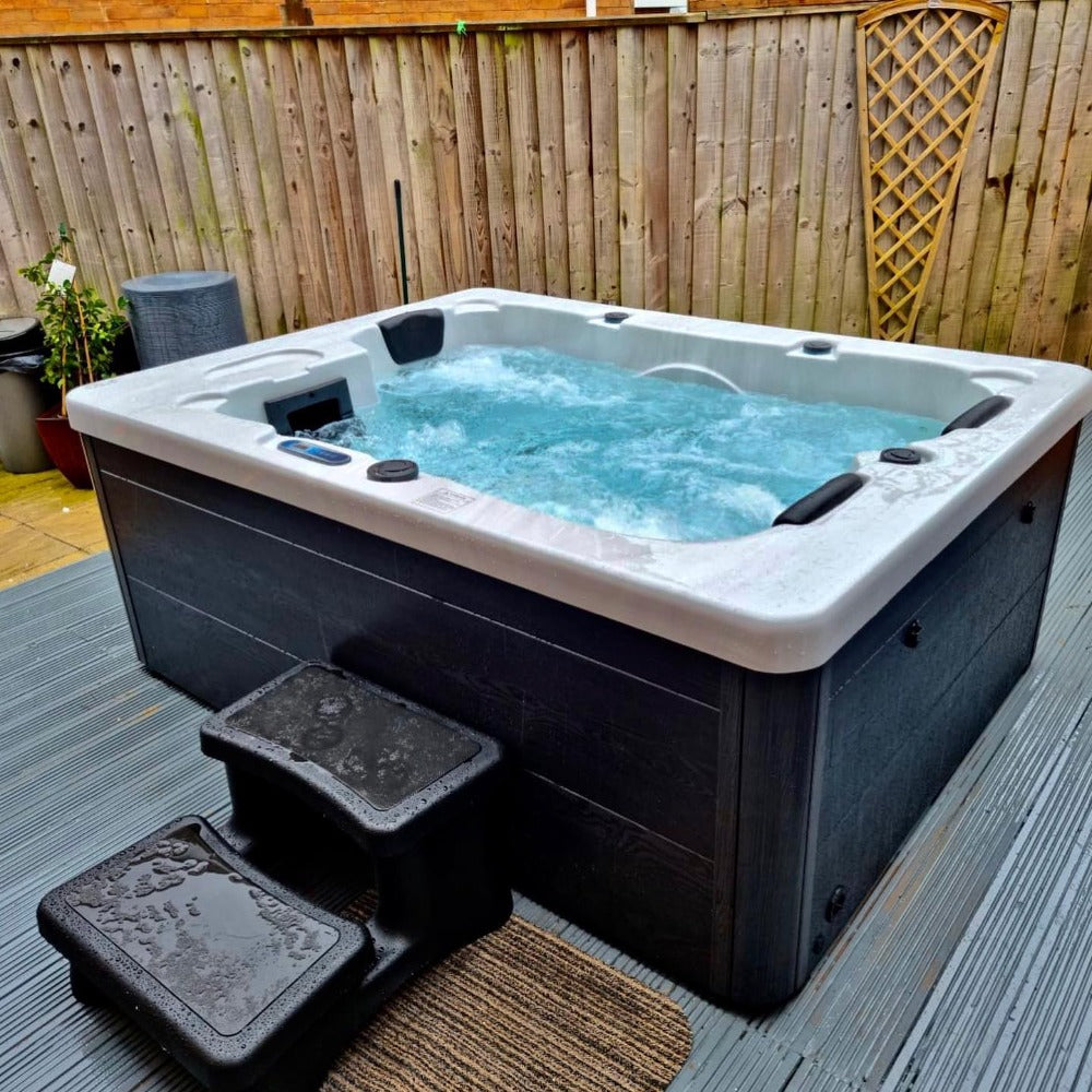 small hot tub on decking
